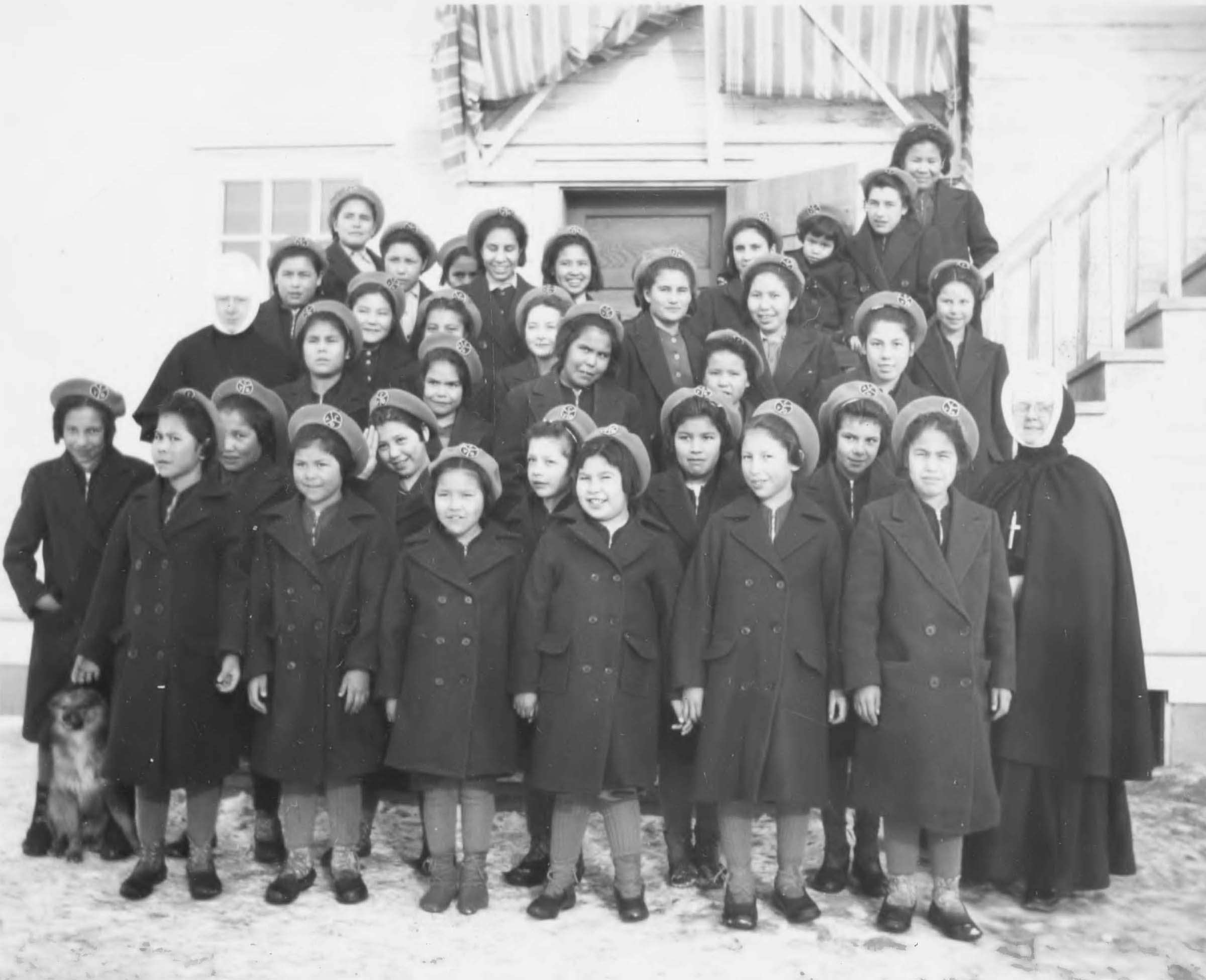 Group of students outside of building at Fort Vermilion St. Henri school 