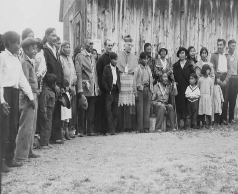 Group of people outside from Lower Post School 