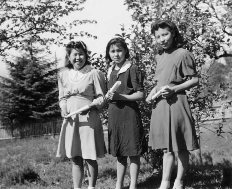 Black and white photo of three Indigenous teen girls and the text United Nations Declaration on the Rights of Indigenous Peoples.