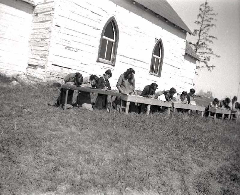 Group of students outside at Wabasca St. Johns school