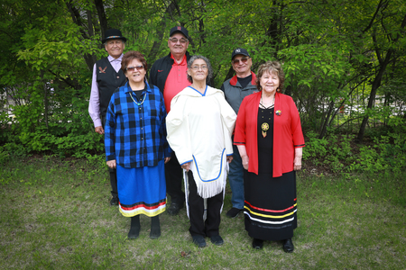 Survivor circle members standing in a group