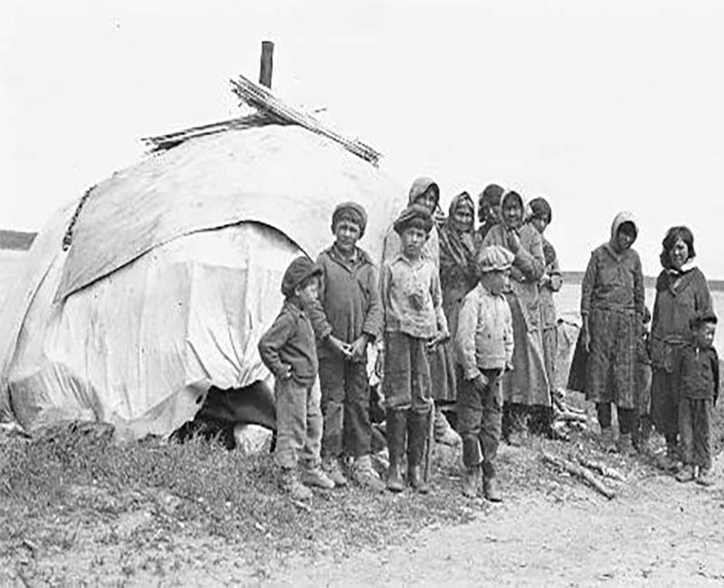 Group of people outside aFort George Church of England school