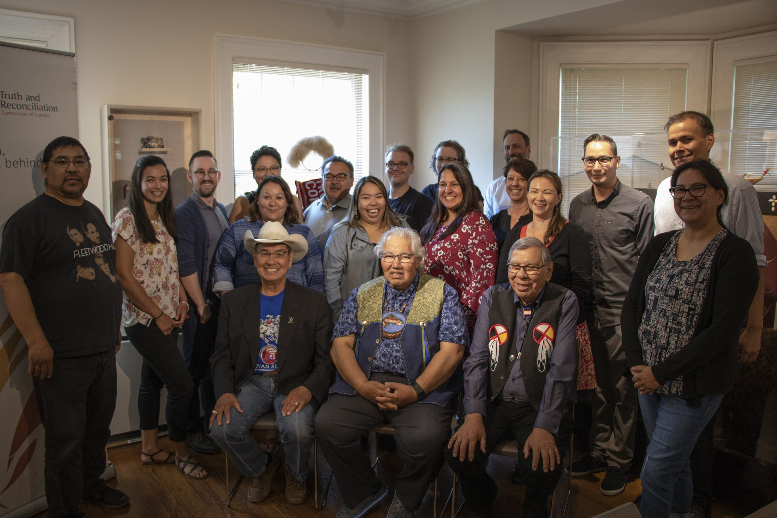 Group of Survivors and staff at NCTR building